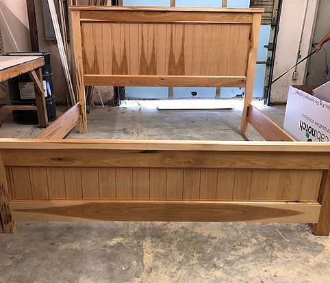 Rice Furniture & Design Center | custom built light wood bed frame in the design center workshop