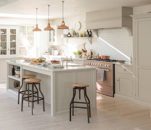 Rice Furniture & Design Center | wooden bar stools with dark metal legs in front of a white kitchen island